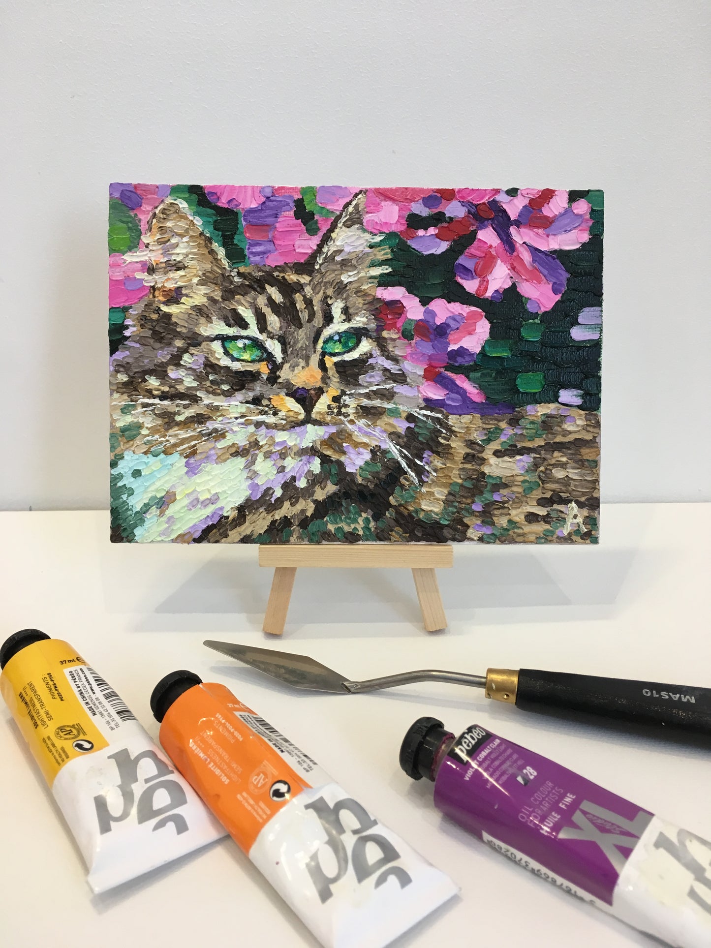 Impasto oil painting "Cat in flowers"